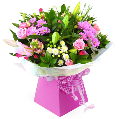 Pretty in Pink - This vibrant bouquet blends lush greens and delicate pinks, perfect for brightening any occasion and spreading joy. An ideal gift for someone special.
