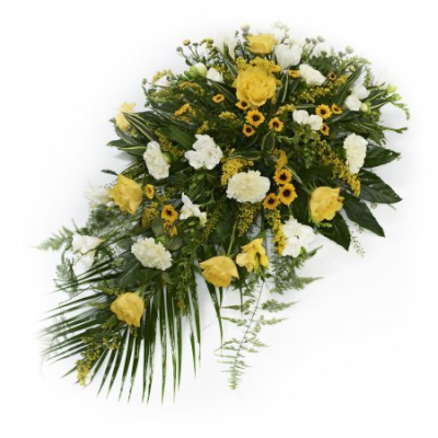 Yellow Single Ended Spray - Traditional single ended spray in oasis made in yellow and white flowers.



A spray of flowers in shades of yellow/cream and white.

Your florist will make you a beautiful arrangement called a “spray”, the freshest flowers of the season arranged into florist foam. The foam holds water meaning that your tribute will arrive at its destination in perfect condition. The shape is roughly a teardrop shape, tapering to a point at one end. This is both a traditional and natural looking display, with the flower stems being left a little bit longer than on say a wreath or posy style funeral arrangement.

Many varieties of flowers can be used, often including oriental lilies, longi lilies, lizianthus, roses, carnations, spray carnations, statice, wax flower, september flower, solidago, eryngium, hypericum berries, eucalyptus, ruscus, parviola, leather leaf, aspidistra leaves, palm leaves, twigs, pussy willow and bere grass strands.