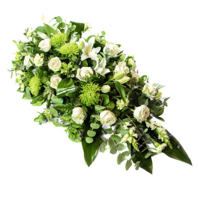 Extra Large White and Green Spray - A spray of flowers in shades of white and green.

Your florist will make you a beautiful arrangement called a “spray”, the freshest flowers of the season arranged into florist foam. The foam holds water meaning that your tribute will arrive at its destination in perfect condition. The shape is either a teardrop shape, tapering to a point at one end, or a diamond shape, with points at each end. This is both a traditional and natural looking display, with the flower stems being left a little bit longer than on say a wreath or posy style funeral arrangement.

Many varieties of flowers can be used, often including oriental lilies, longi lilies, lizianthus, roses, carnations, spray carnations, statice, wax flower, september flower, solidago, eryngium, hypericum berries, eucalyptus, ruscus, parviola, leather leaf, aspidistra leaves, palm leaves, twigs, pussy willow and bere grass strands.

This piece can be created up to a length of around 6', making it a true statement arrangement, and would normally consist of white oriental lilies, white roses, green chrysanthemum blooms, snap dragons, lizianthus and altromeria.