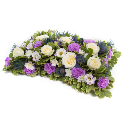 Purple and White Pillow - Beautiful pillow shaped tribute in purple, white and lilac flowers.



Your florist will create this pillow-shaped tribute using a selection of mixed variety and colour flowers, from those best available from the season. The flower stems are cut fairly short and inserted into water carrying florist oasis foam, so the tribute will retain its shape for days to come.

Varieties often include: chrysanthemums, bloom chrysanthemums, roses, carnations, spray carnations, lizianthus, solidago, gypsophila, wax flower, september flower, germini, spray roses, freesia, tulips, eucalyptus, parviola, leather leaf, myrtle, mint, rosemary, thyme, oregano, hypericum berries and eryingium.

This is a more formal style tribute, still popular today, due to its long-lasting properties. A pillow shape can be chosen to comemmorate the passing of a loved one and makes a change from the usual wreath and posy style arrangements often seen.